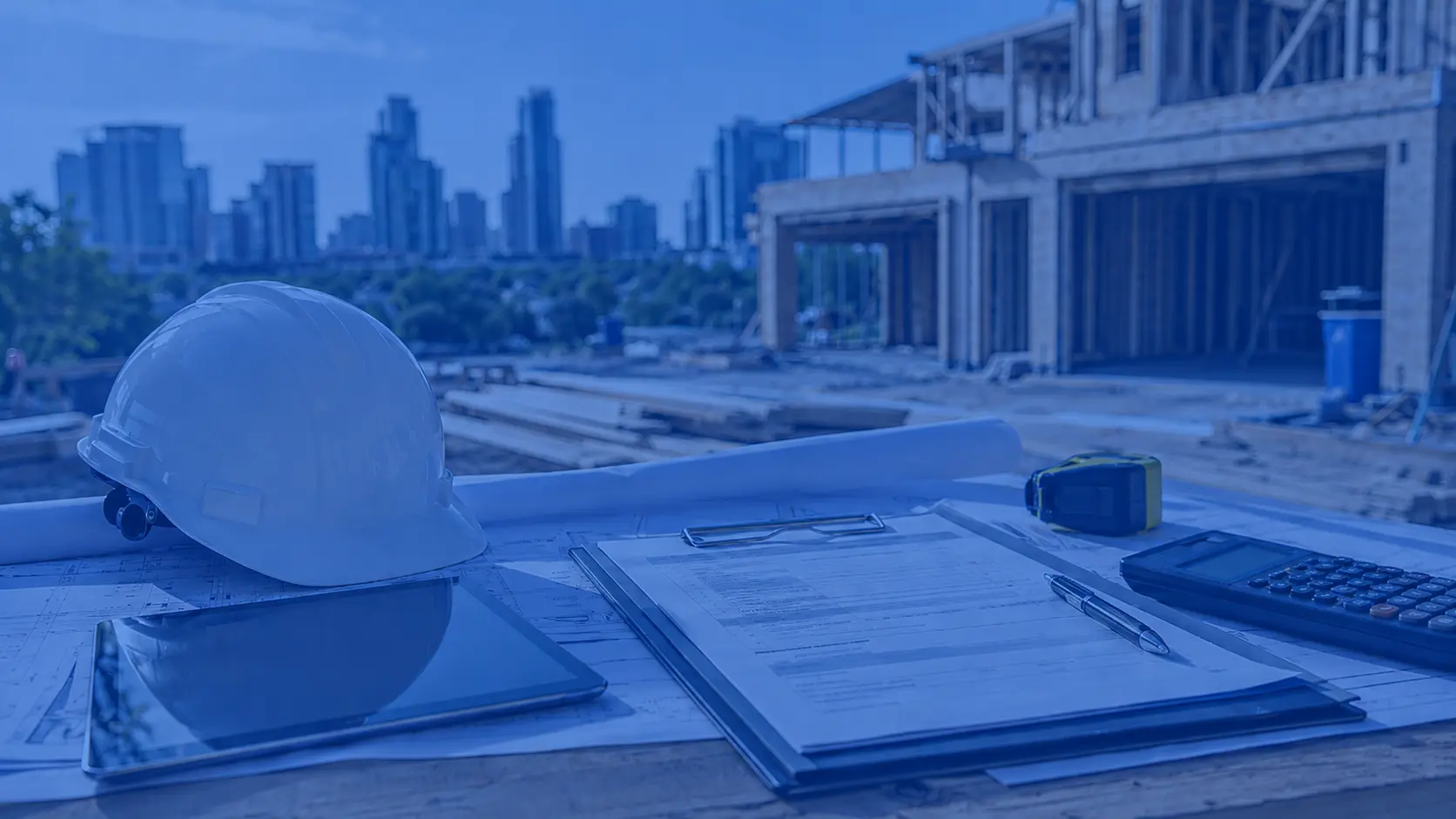 Austin contractor on jobsite reviewing general liability insurance cost guide for 2026