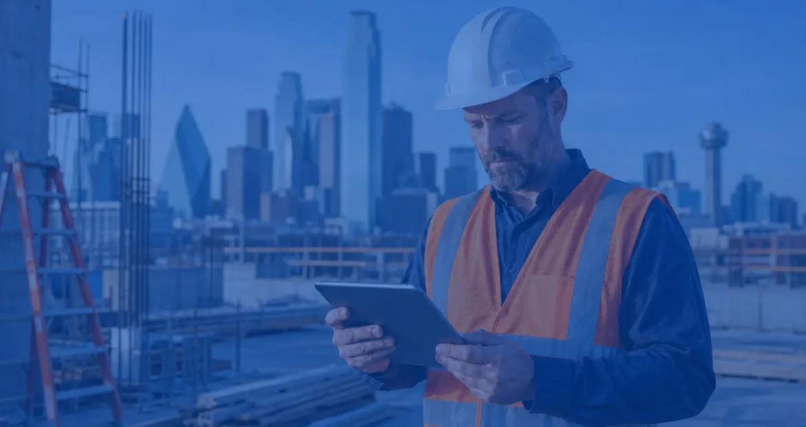Dallas, TX contractor on a jobsite reviewing a general liability insurance cost guide for 2026
